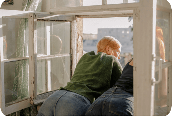 Tenants At Window Of Property In Edinburgh
